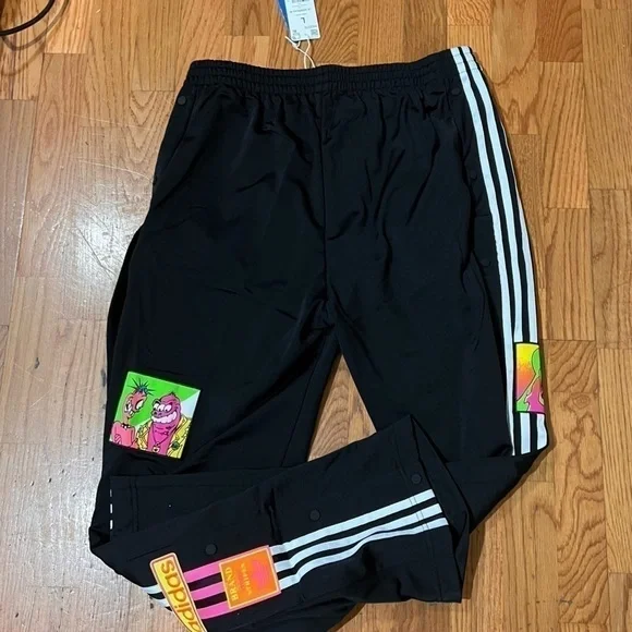 JEREMY SCOTT X ADIDAS limited track pants with cartoon patches. Nwt 90s cartoons